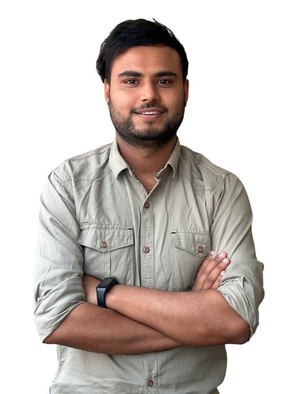 Gaurav Chapagain standing with arms crossed